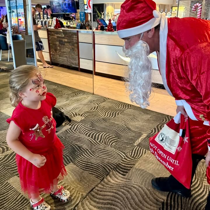 Featured image for “Santa just arrived to our Christmas party and he’s already making new friends…”